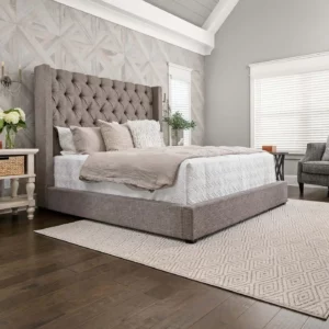 Bedroom Shaw Floors area rug | The Flooring Center